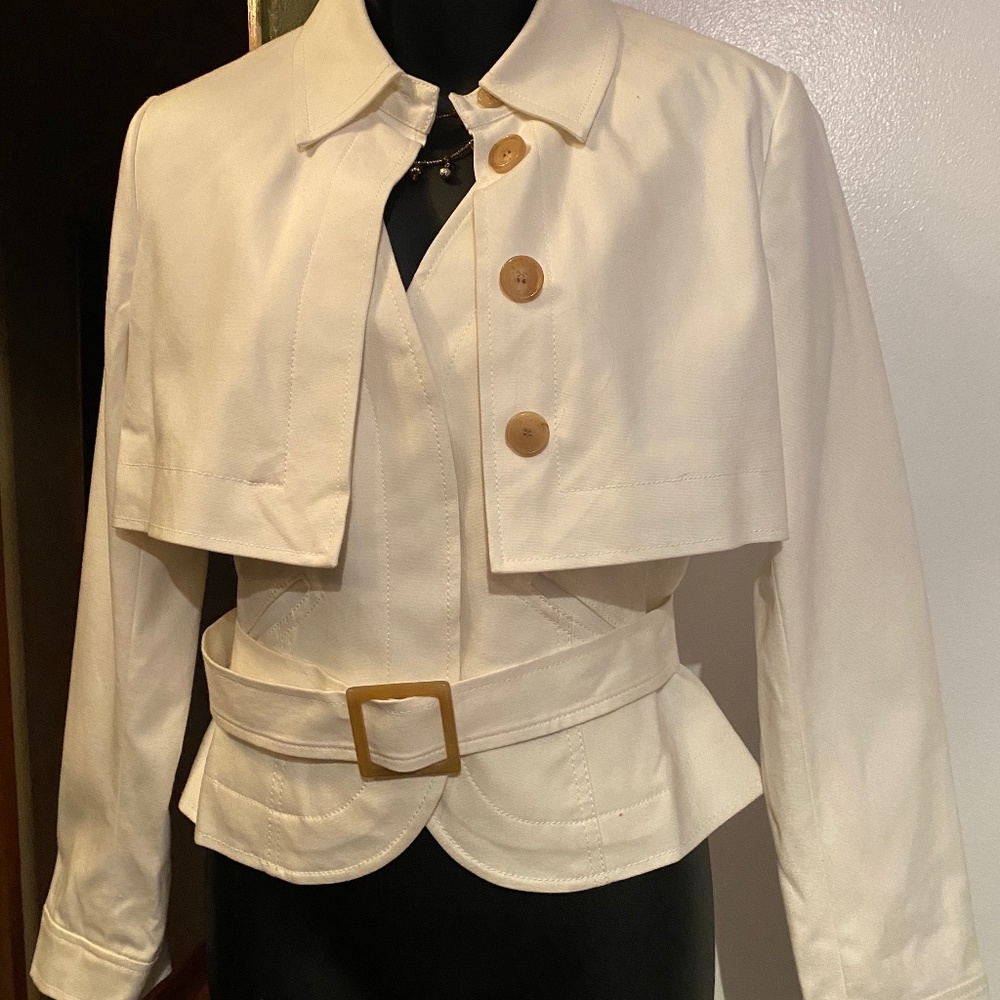 Two-piece cream Worth with belt.